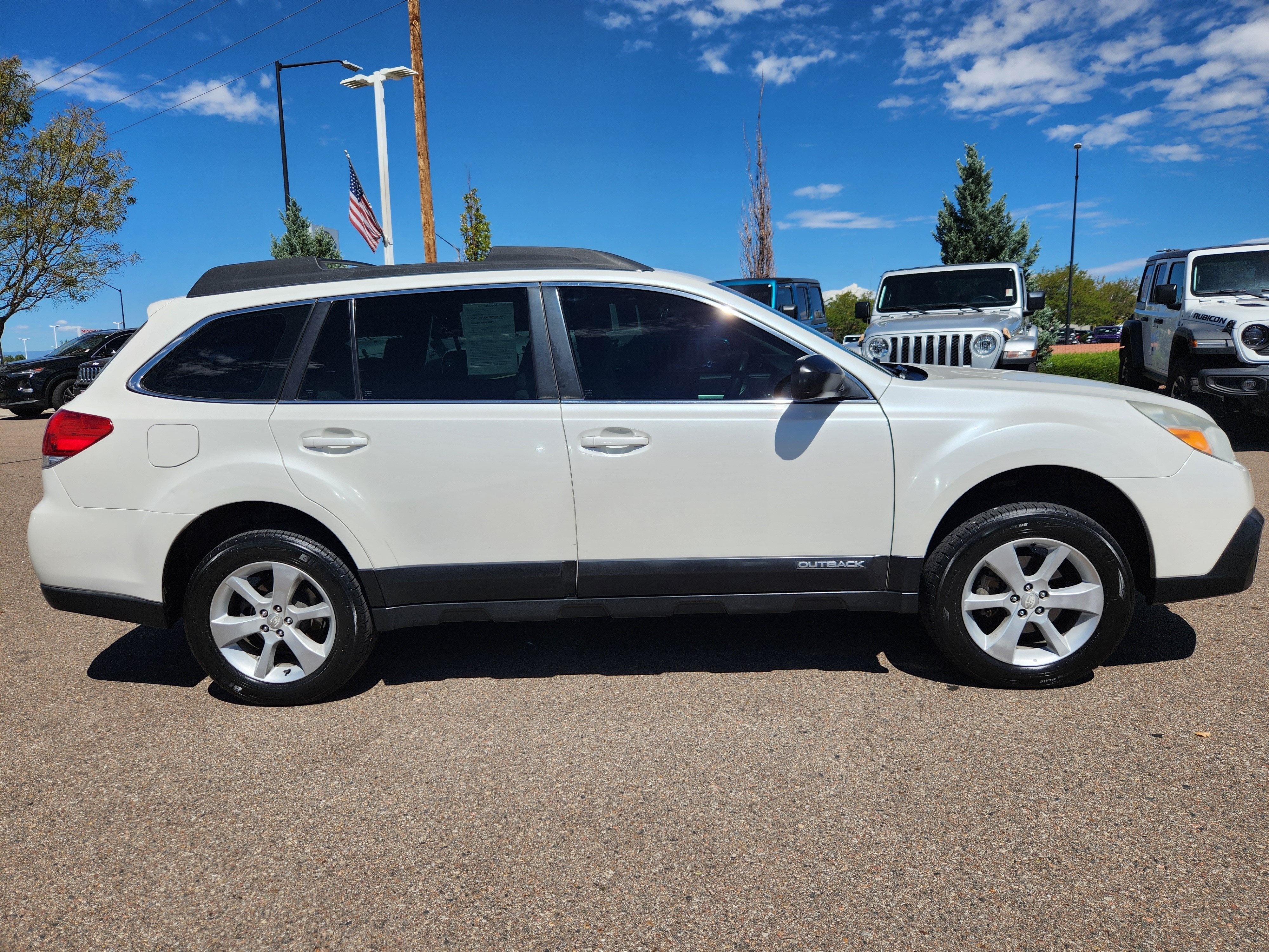 Used 2014 Subaru Outback Base with VIN 4S4BRCAC7E3231133 for sale in Pueblo, CO
